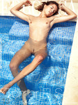 "Antea dips her petite, tight body with perk tits in the pool"